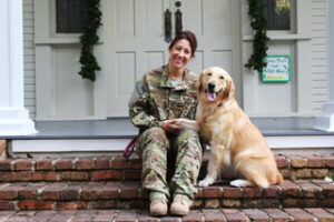 Therapy dog Rio and her handler Col. Elizabeth Hoettels when she returned home from deployment.