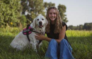 Aubrey Hanger Alliance of Therapy Dogs Junior Handler posing with her therapy dog